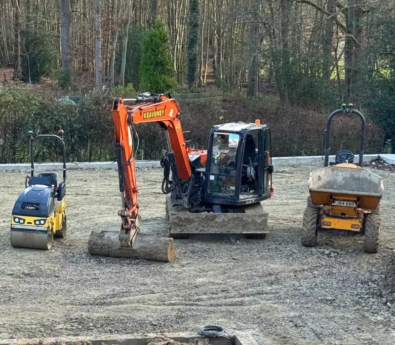 Digger , dumper and roller for groundworks