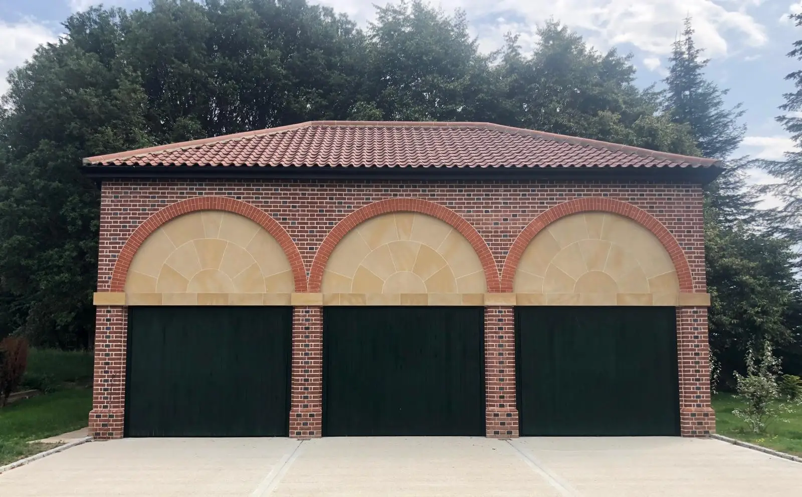 Three bay brick built garage.