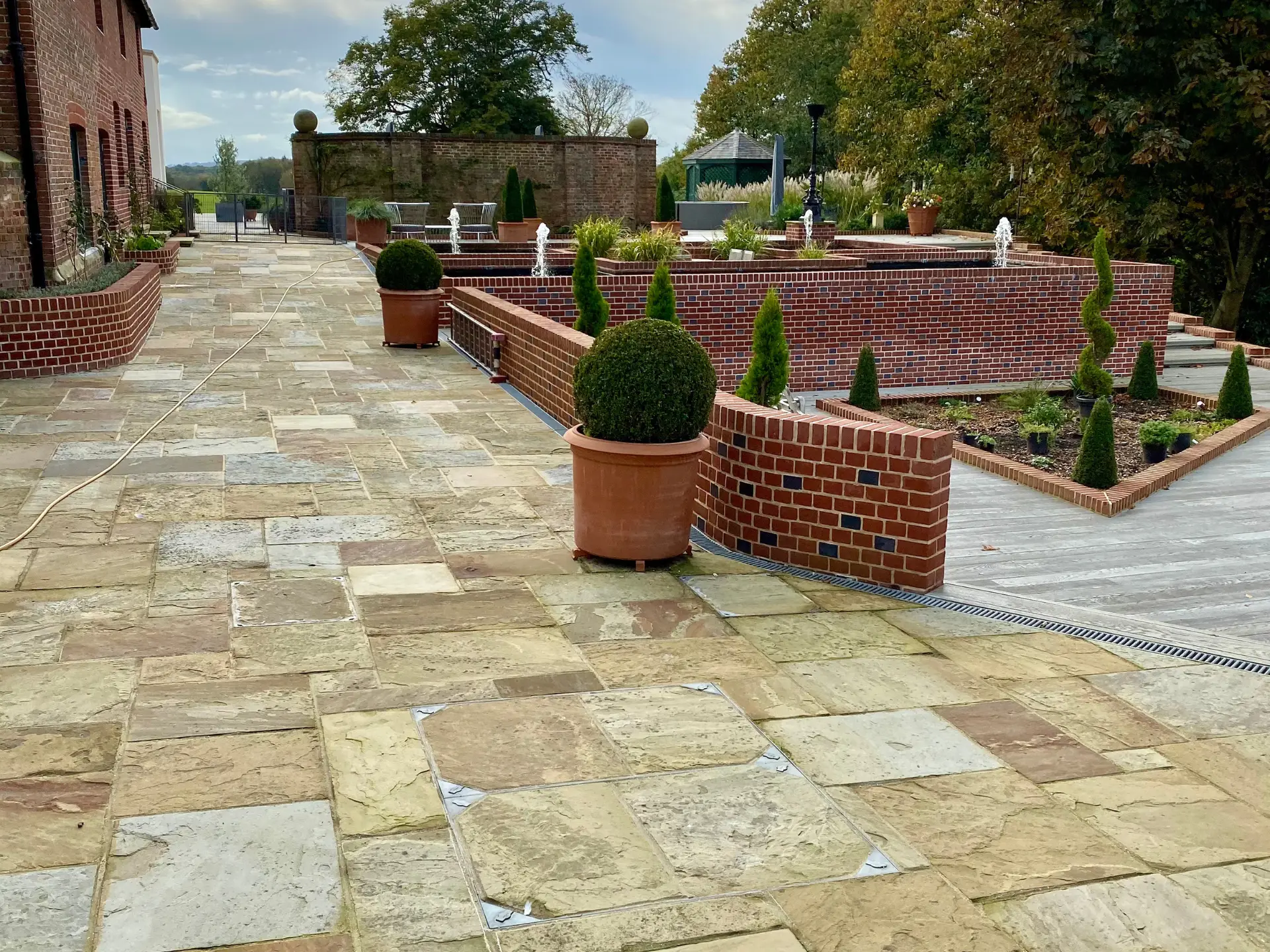 Flag stone path installation with millboard decking