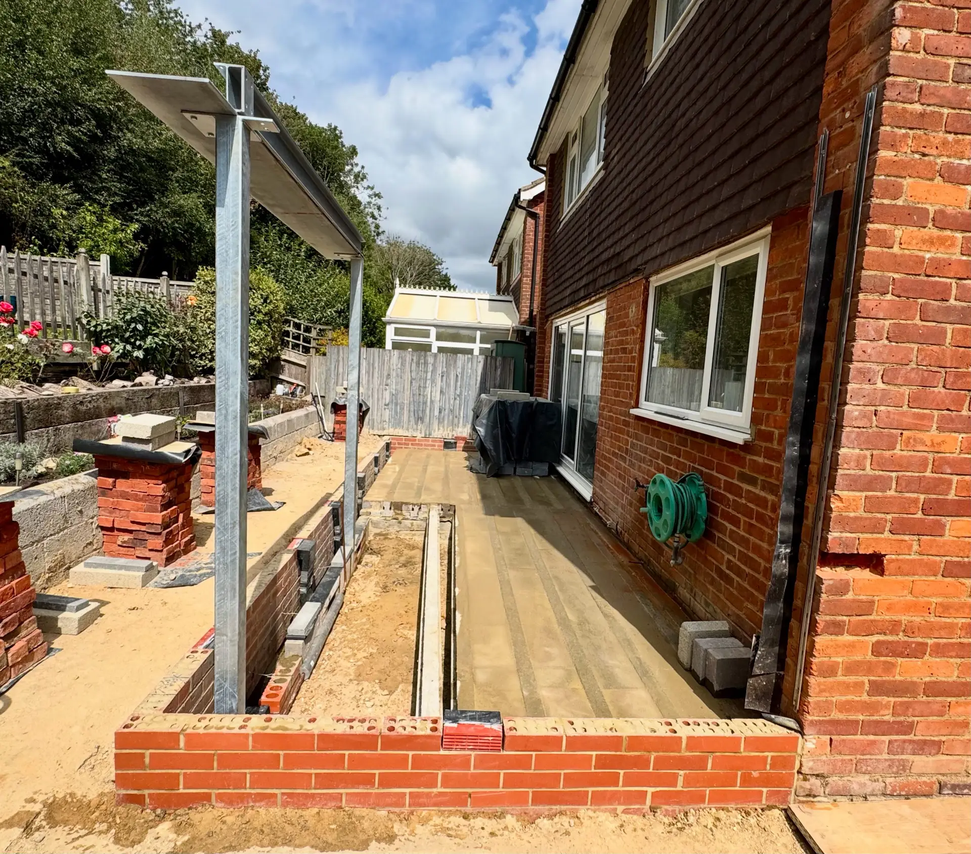 Concrete padstones installed for RSJ beam support in brick wall opening